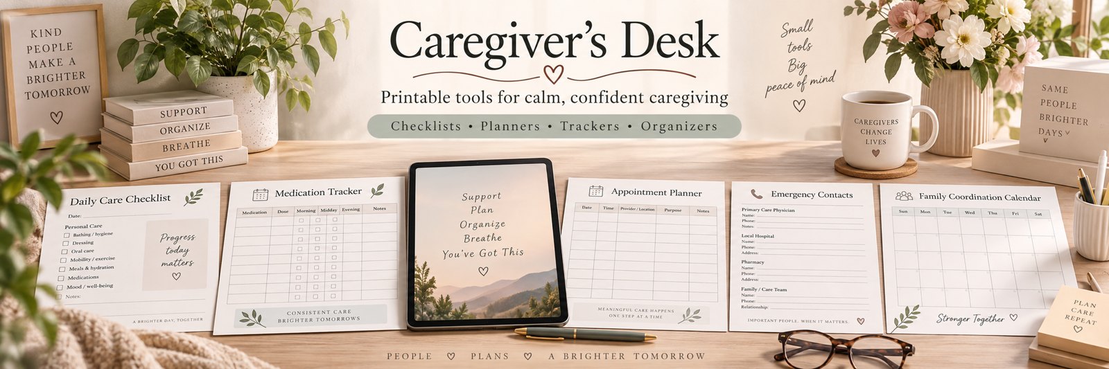 A calm desk with Caregivers Desk planner pages, a tablet, flowers, and a mug reading 'Caregivers change lives'